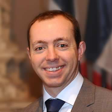 Simon P.
